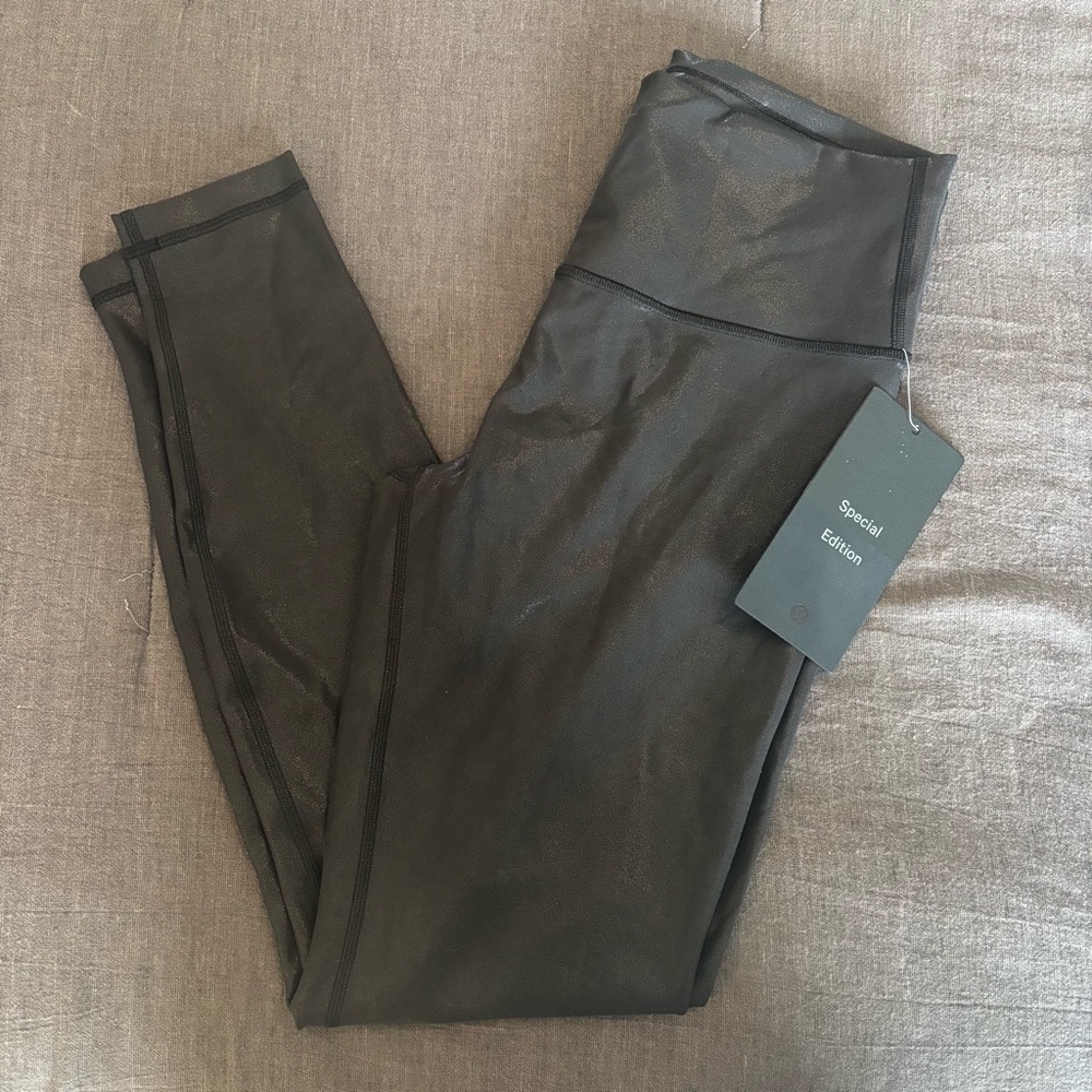 Lululemon WUNDER train HR tight 28” foil color RFXB black size 10 #367